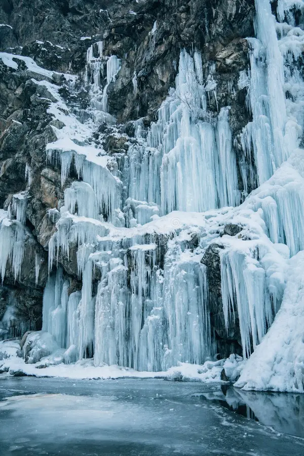 vertical shot frozen waterfall kashmir 260543718